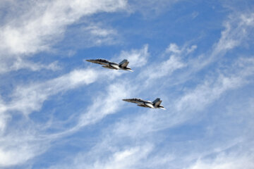 Fighter jets in clouds