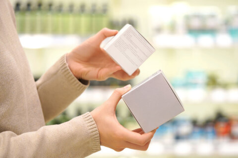 Shopper choosing between two items
