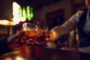 What connects whiskey with DC's famous cherry trees?