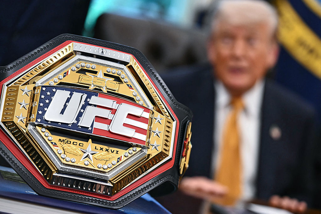 A UFC championship belt is displayed as US President Donald Trump speaks about the upcoming "UFC Freedom 250" event, in the Oval Office of the White House on May 6, 2026, in Washington, DC. An Ultimate Fighting Championship event will be staged on the White House's South Lawn in June. The June 14 event has been dubbed "UFC Freedom 250," in reference to the United States' 250th anniversary celebrations this summer.