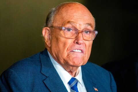 Giuliani returns to his show after viral pneumonia hospitalization