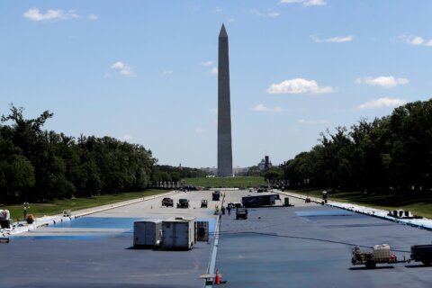 A nonprofit sues to halt Trump’s ‘American flag blue’ repaint of the Reflecting Pool