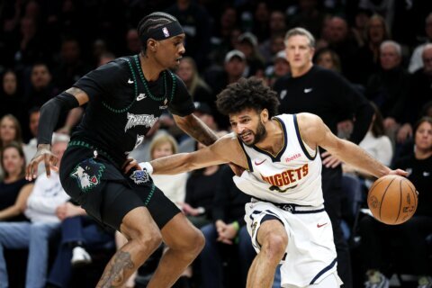 Jaden McDaniels leads the T-wolves on both ends of the court in 110-98 clincher to oust Nuggets in 6