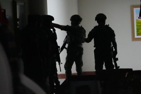 Gunfire breaks out in Philippine Senate where authorities have tried to arrest a senator