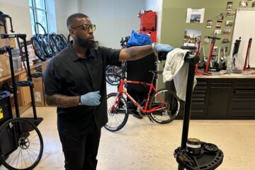 person fixing bike