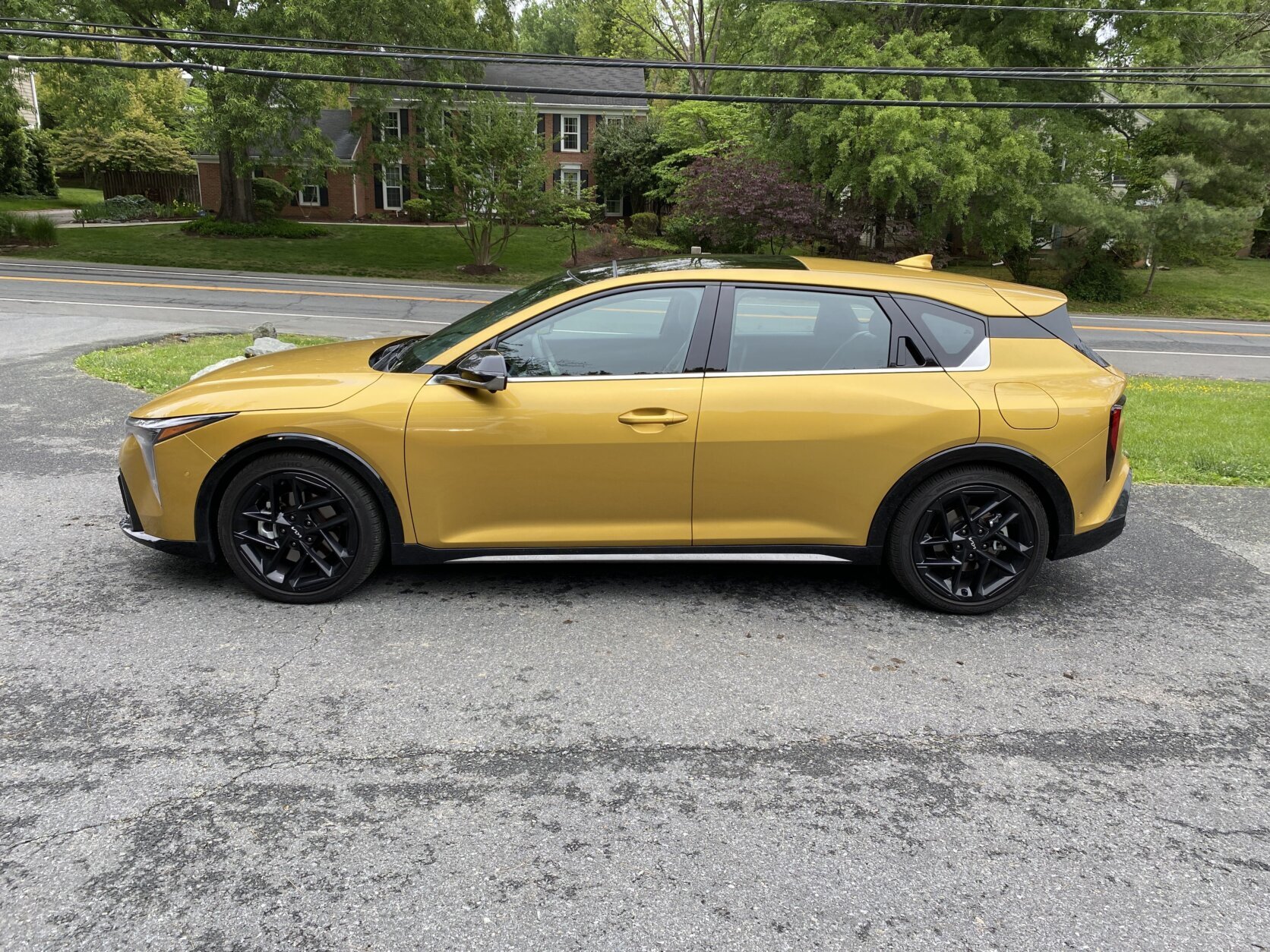 Yellow Kia car.