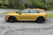 Yellow Kia car.