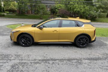 Yellow Kia car.