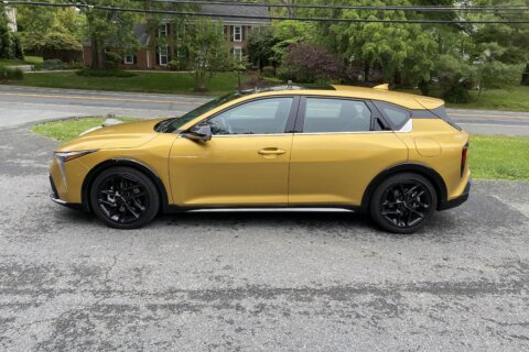 Yellow Kia car.