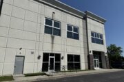 exterior view of a two-story warehouse.