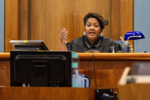 Judge dismisses charges against ex-administrator accused after student shot teacher