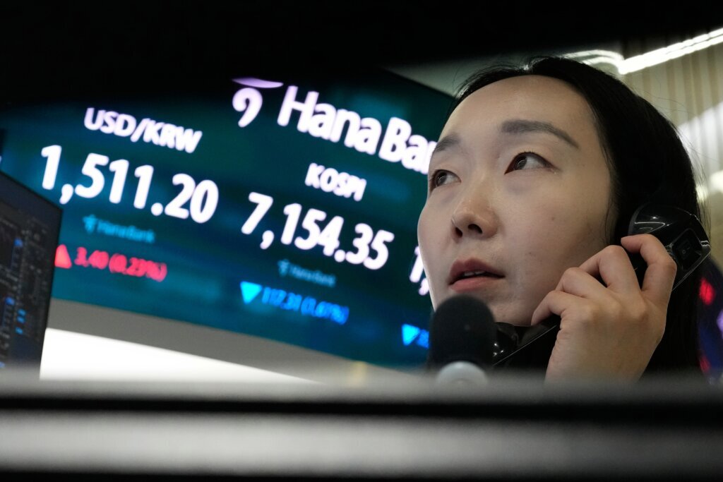 Asian shares surge after oil prices slip and Wall Street resumes its AI rally