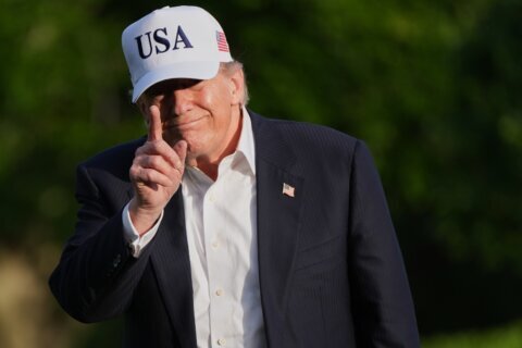 The Latest: World shares and oil prices react to Trump’s warning to Tehran over stalled negotiations
