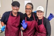 three people in aprons
