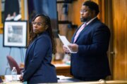 Judge dismisses charges against school official accused of ignoring warnings of gun before shooting