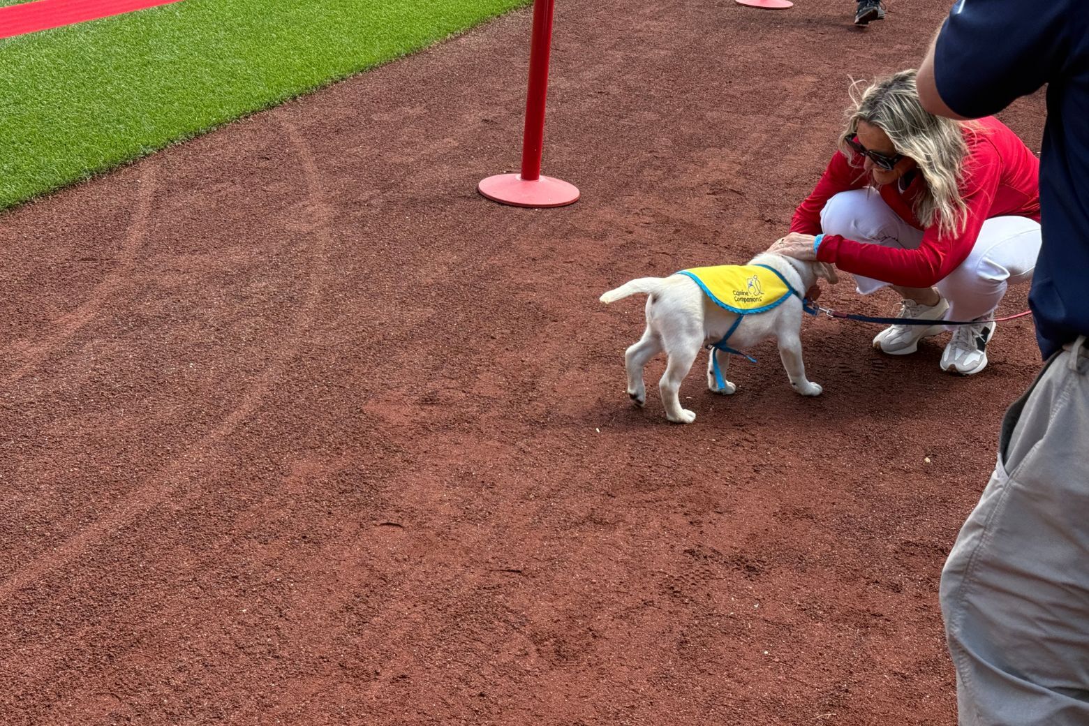 natty greets someone on the field