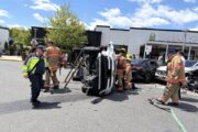 Vehicle on its side following a crash.