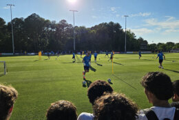 people watch Croatian players practice