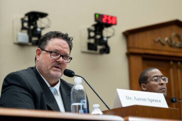 Loudoun County, Va. Public Schools Superintendent Dr. Aaron Spence, left, testifies during a House Education and Workforce Committee hearing on parental rights and school content policies, Wednesday, June 10, 2026 in Washington. (AP Photo/Kevin Wolf)