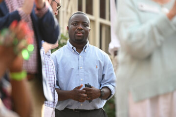Adrian Boafo, a Maryland state delegate and candidate for U.S. Congress talks with supporters at the "AmeriPac Bull Roast" Friday, June 12, 2026, in Mitchellville, Md. (AP Photo/Gail Burton)