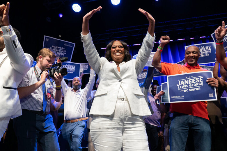 D.C. Council members Janeese Lewis George wave to the crowd as she celebrates after winning D.C. Mayor Democratic primary election during the Election Night Party at the Howard Theatre Tuesday, June 16, 2026, in Washington. (AP Photo/Jose Luis Magana)