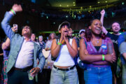 Supporters celebrate after D.C. Council member Janeese Lewis George won the D.C. Mayor primary election during an election night party at the Howard Theatre, Tuesday, June 16, 2026, in Washington. (AP Photo/Jose Luis Magana)