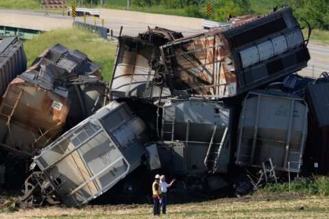 One dead and another injured after train strikes semi-truck in Iowa