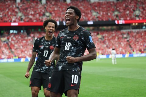 Jonathan David’s hat trick propels Canada to its first World Cup win, 6-0 over Qatar