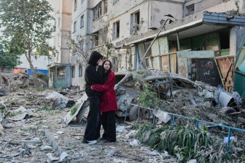 Russian attack on Ukraine kills at least 16 and traps others in damaged buildings