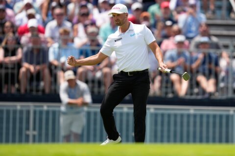 A year after smashing a locker, Wyndham Clark finds himself leading at another US Open