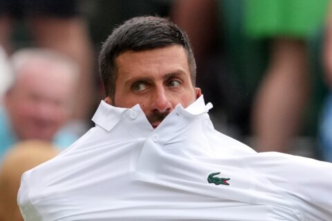 A marriage proposal and Bad Bunny steal attention from Novak Djokovic’s opening Wimbledon match
