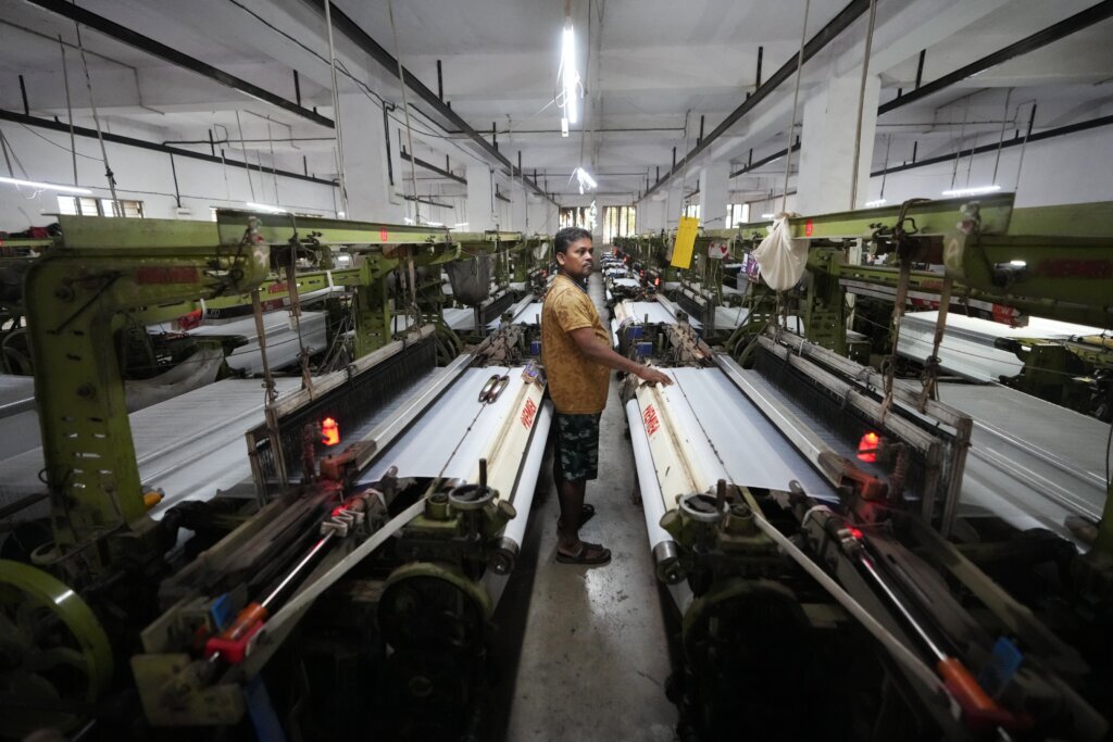 How one Indian textile worker copes with extreme heat in factory work and cramped living quarters