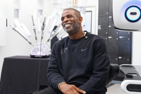 Deion Sanders says he feels like his old self a year after surgery: ‘I consider myself cancer-free’