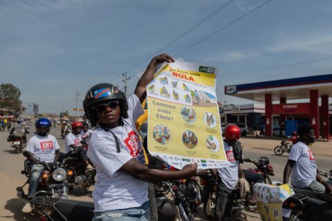 Motorcycle taxi drivers in Congo rally for Ebola awareness as attacks hinder response
