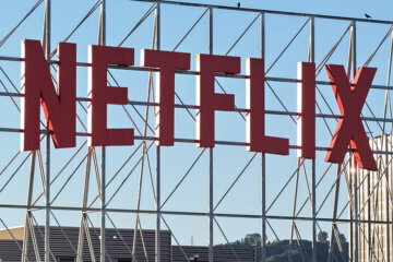In an aerial view, the Netflix logo is displayed above Netflix corporate offices on December 5, 2025, in Los Angeles, California. (Photo by Mario Tama/Getty Images)