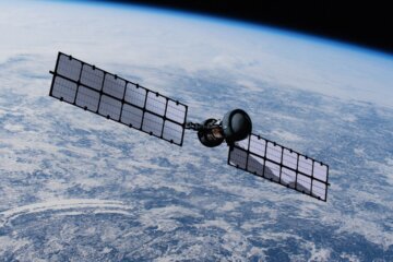 Satellite in space orbiting the planet Earth