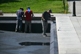 Contractors continue work on the Reflecting Pool on the National Mall