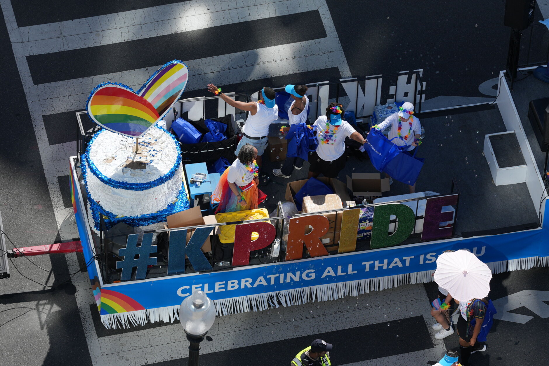 Parade-goers participate in the annual Capital Pride Parade in Washington, DC, on June 20, 2026.  (Photo by Ken Cedeno / AFP via Getty Images)