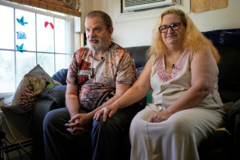 A robot is helping an ailing couple stay in their home. Are more to come for an aging population?