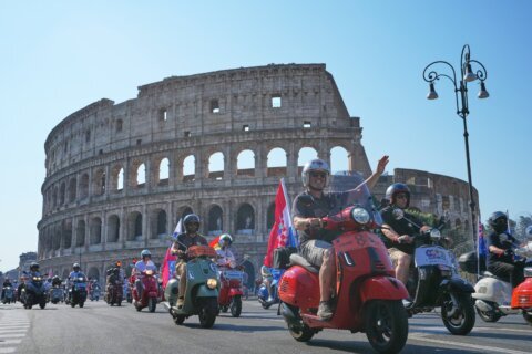 Thousands of Vespas swarm Rome’s historic center to mark iconic scooter’s 80th anniversary