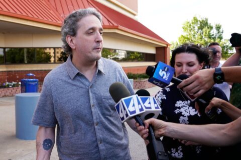 Former Oklahoma death row inmate has a new trial set for a 1997 killing of motel owner