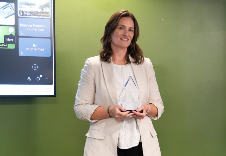 Virginia "Nurse of the Year" Heather Williams holding a trophy