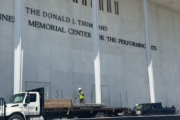<p>Crews prepare to remove Donald Trump’s name from the Kennedy Center building in D.C. (WTOP/Jimmy Alexander)</p>
