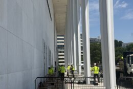 <p>Crews prepare to remove Donald Trump’s name from the Kennedy Center building in D.C. (WTOP/Jimmy Alexander)</p>
