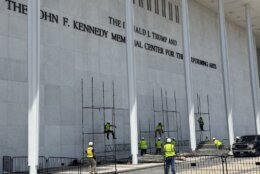 <p>Crews prepare to remove Donald Trump’s name from the Kennedy Center building in D.C. (WTOP/Jimmy Alexander)</p>
