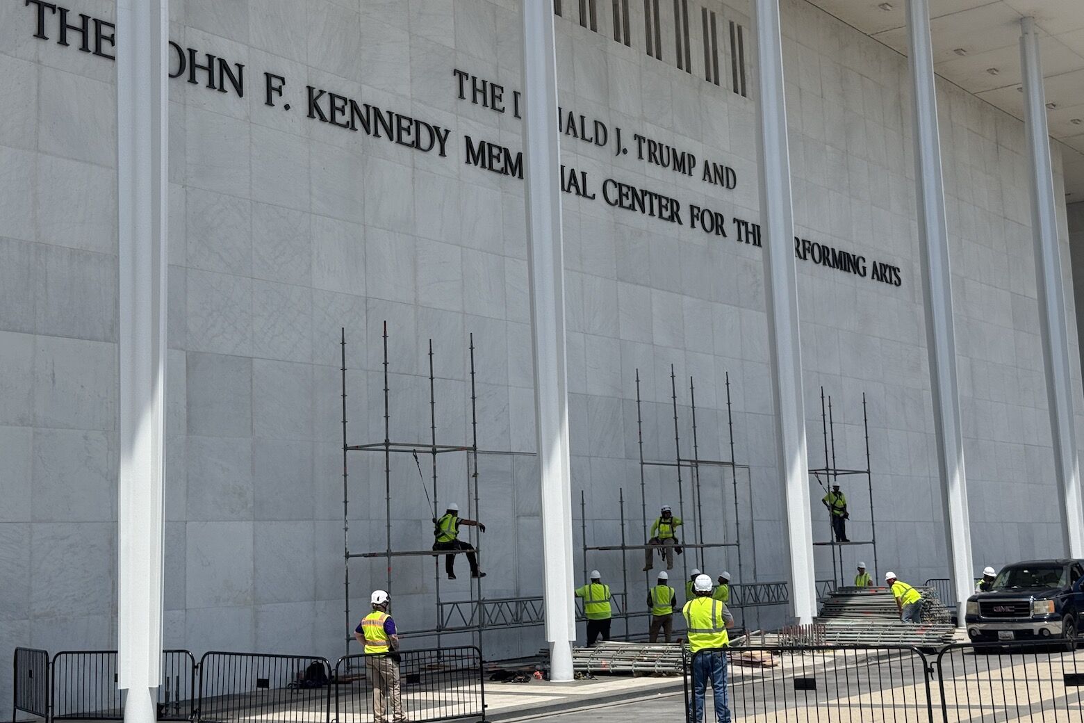<p>Crews prepare to remove Donald Trump’s name from the Kennedy Center building in D.C. (WTOP/Jimmy Alexander)</p>
