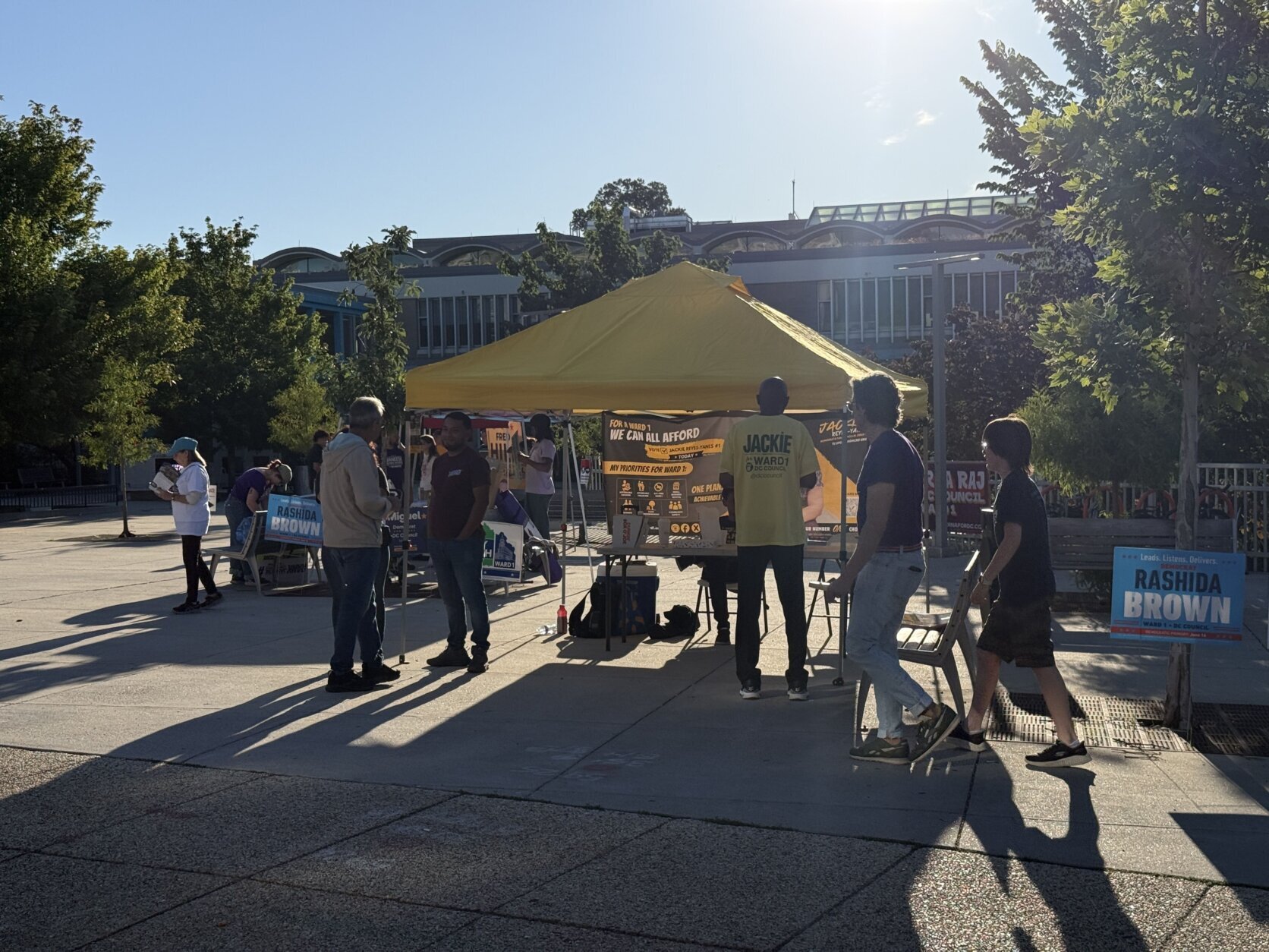 Campaign teams outside of the polling place