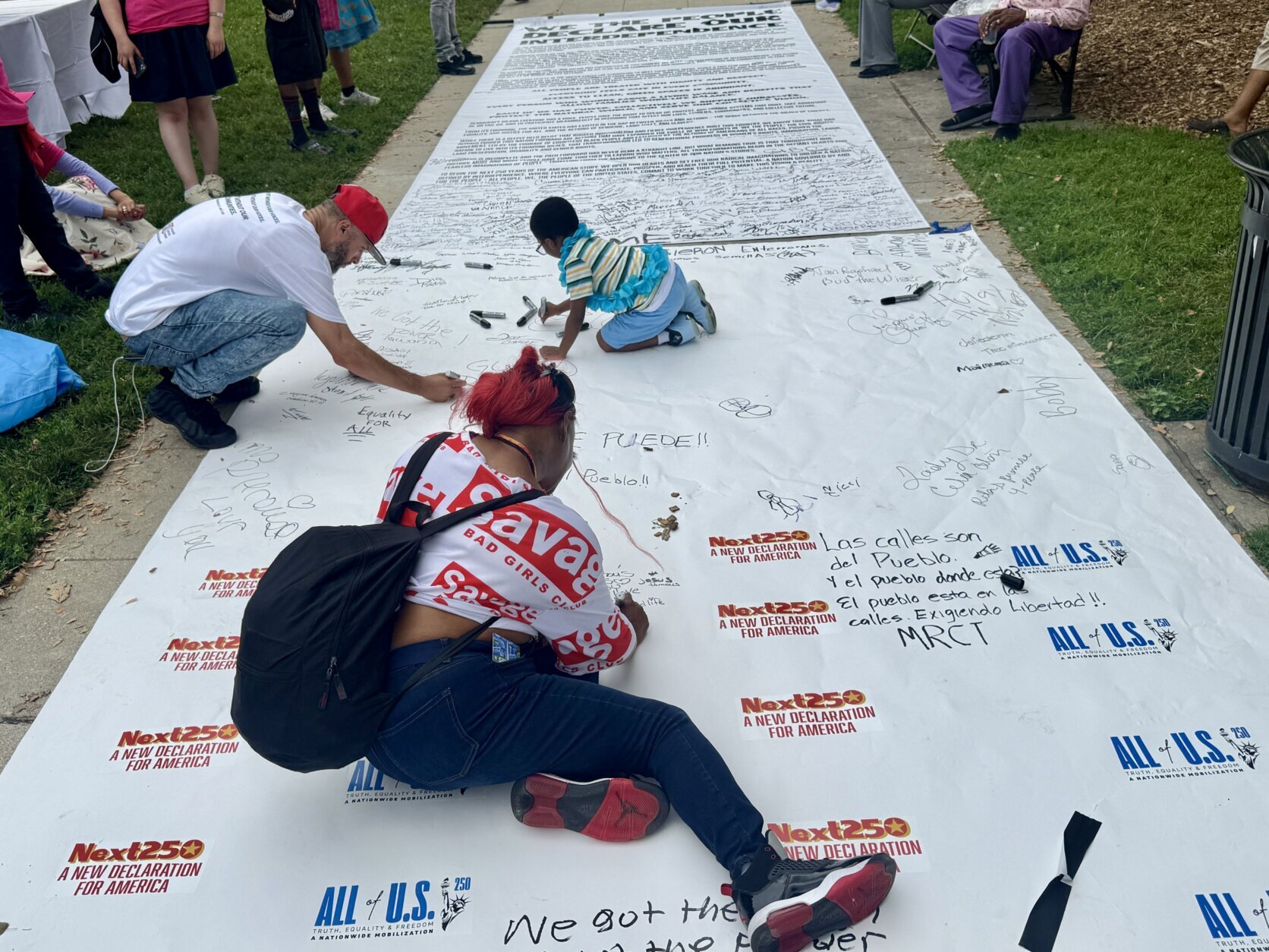 Next 250 attendees sign document
