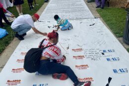 Next 250 attendees sign document