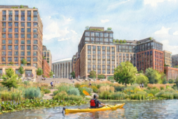 person kayaking near stadium